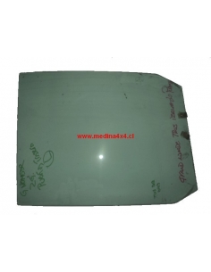 Vidrio puerta trasero izquierdo Suzuki Grand Nomade 2000 usada